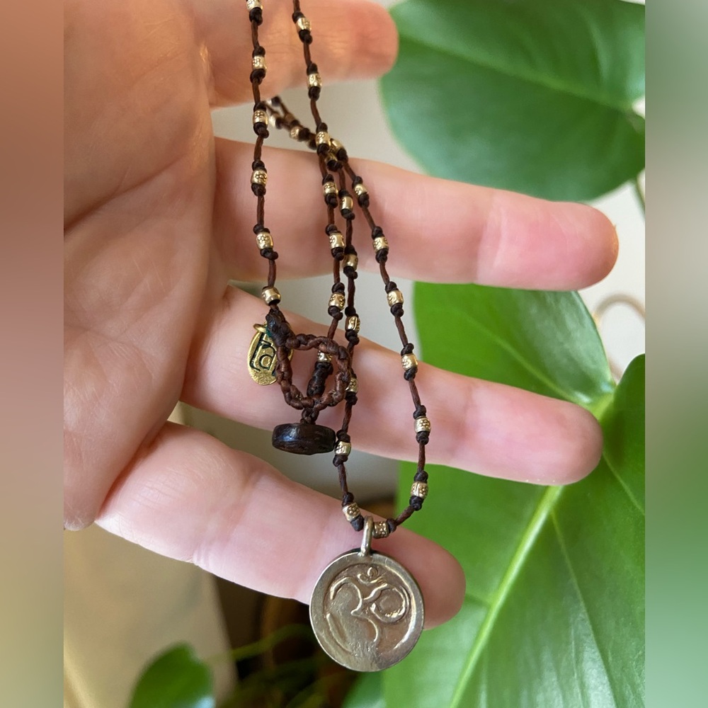 TAI -  OM Pendant On Brown Hand knotted Necklace